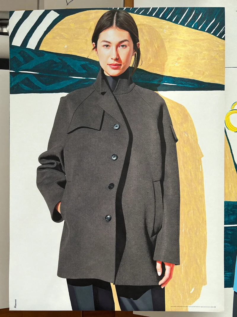 Studio illustrato di cappotto asimmetrico in lana color carbone
